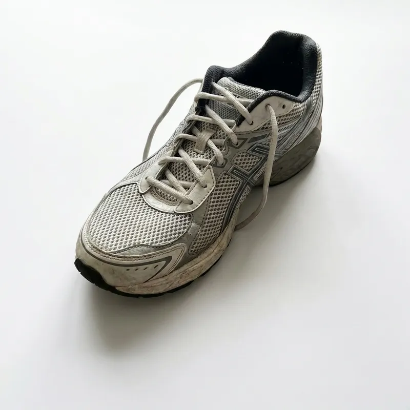 The same sneaker on a seamless white studio background with a soft natural shadow